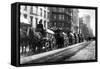 A Line Of Horse-Drawn Wagons Hauling Snow In New York City-null-Framed Stretched Canvas