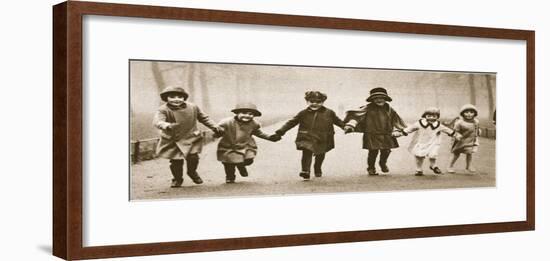 A Line of Well-Dressed Children Running in Hyde Park, from 'Wonderful London', Published 1926-27-English Photographer-Framed Giclee Print