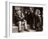A Little Boy Holding a Banana Whilst Other Children Gaze Longingly at It-null-Framed Premium Photographic Print