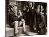 A Little Boy Holding a Banana Whilst Other Children Gaze Longingly at It-null-Mounted Premium Photographic Print