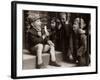 A Little Boy Holding a Banana Whilst Other Children Gaze Longingly at It-null-Framed Photographic Print