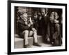 A Little Boy Holding a Banana Whilst Other Children Gaze Longingly at It-null-Framed Photographic Print