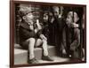 A Little Boy Holding a Banana Whilst Other Children Gaze Longingly at It-null-Framed Photographic Print