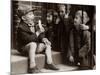 A Little Boy Holding a Banana Whilst Other Children Gaze Longingly at It-null-Mounted Photographic Print