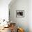 A Little Boy Holding a Banana Whilst Other Children Gaze Longingly at It-null-Framed Photographic Print displayed on a wall