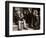 A Little Boy Holding a Banana Whilst Other Children Gaze Longingly at It-null-Framed Photographic Print