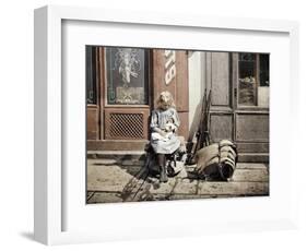 A Little Girl Playing with Her Doll; Two Guns and a Knapsack are Next to He-Fernand Cuville-Framed Giclee Print