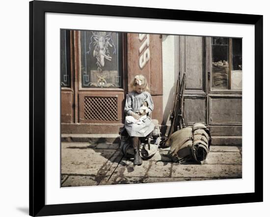 A Little Girl Playing with Her Doll; Two Guns and a Knapsack are Next to He-Fernand Cuville-Framed Giclee Print