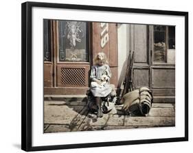 A Little Girl Playing with Her Doll; Two Guns and a Knapsack are Next to He-Fernand Cuville-Framed Giclee Print