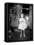 A Little Girl Stands-null-Framed Stretched Canvas