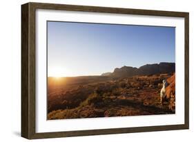 A local man warming up in the morning sun, Andringitra National Park, Ambalavao, central area, Mada-Christian Kober-Framed Photographic Print