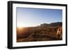 A local man warming up in the morning sun, Andringitra National Park, Ambalavao, central area, Mada-Christian Kober-Framed Photographic Print