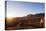 A local man warming up in the morning sun, Andringitra National Park, Ambalavao, central area, Mada-Christian Kober-Stretched Canvas