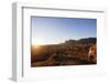 A local man warming up in the morning sun, Andringitra National Park, Ambalavao, central area, Mada-Christian Kober-Framed Photographic Print