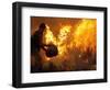 A Local Resident Throws a Bucket of Water on a Forest Fire-null-Framed Photographic Print