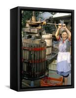 A Local Winemaker Pressing Her Grapes at the Cantina, Torano Nuovo, Abruzzi, Italy-Michael Newton-Framed Stretched Canvas