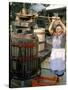 A Local Winemaker Pressing Her Grapes at the Cantina, Torano Nuovo, Abruzzi, Italy-Michael Newton-Stretched Canvas