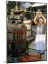 A Local Winemaker Pressing Her Grapes at the Cantina, Torano Nuovo, Abruzzi, Italy-Michael Newton-Mounted Photographic Print