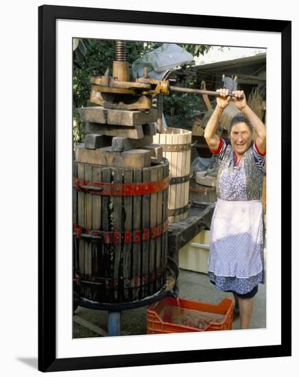 A Local Winemaker Pressing Her Grapes at the Cantina, Torano Nuovo, Abruzzi, Italy-Michael Newton-Framed Photographic Print