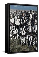 A Lone Android with a Human Flesh Colored Face Amongst a Crowd of Robots-null-Framed Stretched Canvas