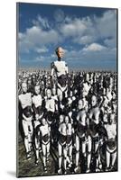 A Lone Android with a Human Flesh Colored Face Amongst a Crowd of Robots-null-Mounted Art Print