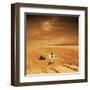 A Lone Astronaut Looks Up at the Sun While Exploring Mars-Stocktrek Images-Framed Art Print