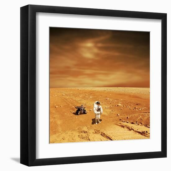 A Lone Astronaut Looks Up at the Sun While Exploring Mars-Stocktrek Images-Framed Art Print