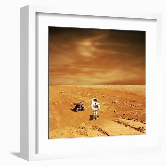 A Lone Astronaut Looks Up at the Sun While Exploring Mars-Stocktrek Images-Framed Art Print