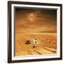 A Lone Astronaut Looks Up at the Sun While Exploring Mars-Stocktrek Images-Framed Art Print