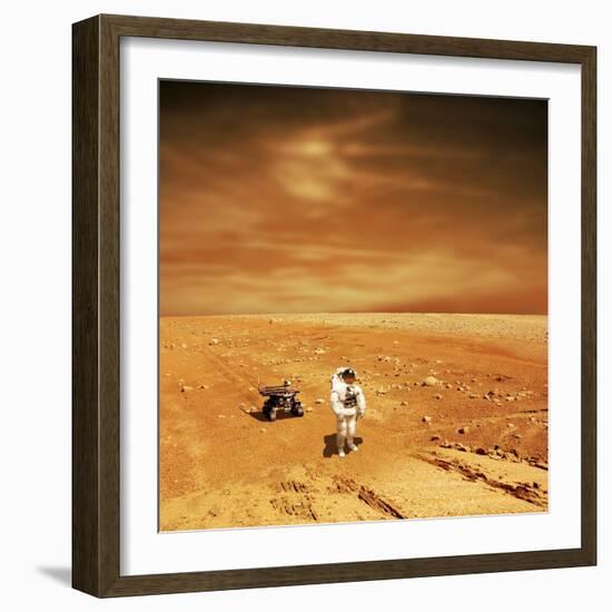 A Lone Astronaut Looks Up at the Sun While Exploring Mars-Stocktrek Images-Framed Art Print