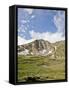 A Lone Backpacker Descends the Trail to Devil's Thumb Lake in the Indian Peaks Wilderness, Colorado-Andrew R. Slaton-Framed Stretched Canvas