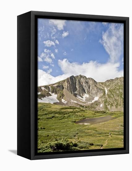 A Lone Backpacker Descends the Trail to Devil's Thumb Lake in the Indian Peaks Wilderness, Colorado-Andrew R. Slaton-Framed Stretched Canvas