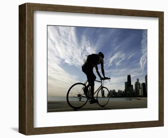 A Lone Cyclists Pedals Along Lake Michigan-null-Framed Photographic Print