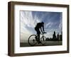 A Lone Cyclists Pedals Along Lake Michigan-null-Framed Photographic Print