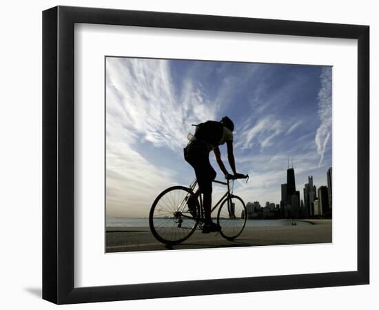 A Lone Cyclists Pedals Along Lake Michigan-null-Framed Photographic Print