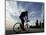 A Lone Cyclists Pedals Along Lake Michigan-null-Mounted Photographic Print