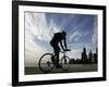 A Lone Cyclists Pedals Along Lake Michigan-null-Framed Photographic Print