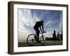 A Lone Cyclists Pedals Along Lake Michigan-null-Framed Photographic Print