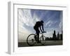 A Lone Cyclists Pedals Along Lake Michigan-null-Framed Photographic Print