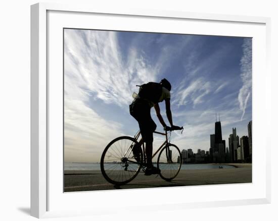 A Lone Cyclists Pedals Along Lake Michigan-null-Framed Photographic Print