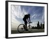 A Lone Cyclists Pedals Along Lake Michigan-null-Framed Photographic Print