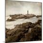 A Lone Man Standing on Large Rocks with the Seas Swirling around Them-Luis Beltran-Mounted Photographic Print