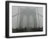 A Lone Runner Makes His Way Across the Fog-Shrouded Brooklyn Bridge Christmas Morning-null-Framed Premium Photographic Print