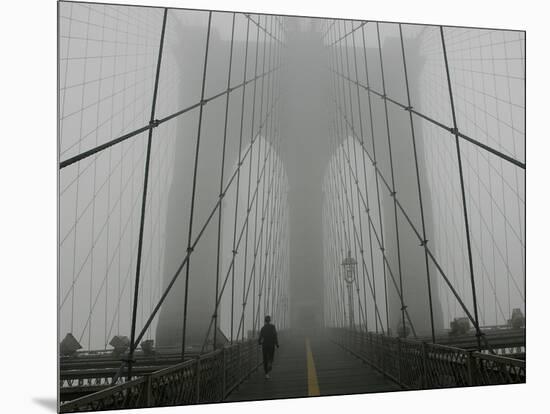 A Lone Runner Makes His Way Across the Fog-Shrouded Brooklyn Bridge Christmas Morning-null-Mounted Photographic Print