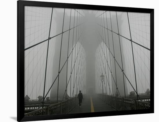 A Lone Runner Makes His Way Across the Fog-Shrouded Brooklyn Bridge Christmas Morning-null-Framed Photographic Print