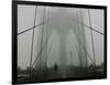 A Lone Runner Makes His Way Across the Fog-Shrouded Brooklyn Bridge Christmas Morning-null-Framed Photographic Print