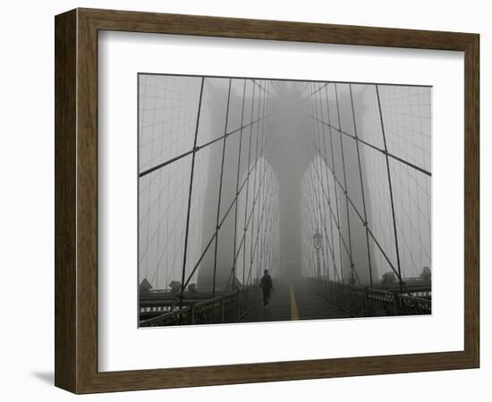 A Lone Runner Makes His Way Across the Fog-Shrouded Brooklyn Bridge Christmas Morning-null-Framed Photographic Print