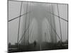 A Lone Runner Makes His Way Across the Fog-Shrouded Brooklyn Bridge Christmas Morning-null-Mounted Photographic Print