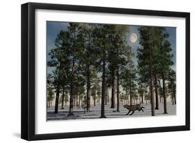 A Lone Sabre-Tooth Tiger Running Through a Snow Covered Forest-null-Framed Art Print