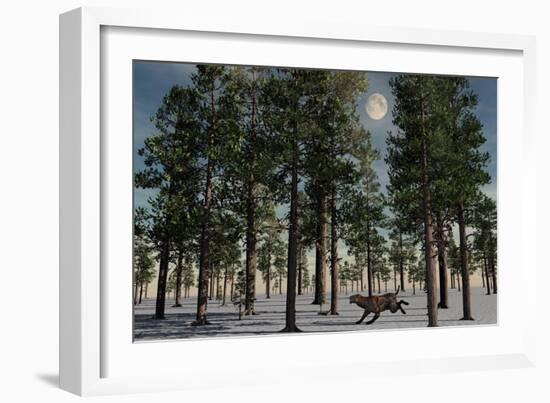 A Lone Sabre-Tooth Tiger Running Through a Snow Covered Forest-null-Framed Art Print